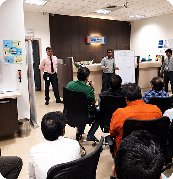 Educators conducting a student workshop