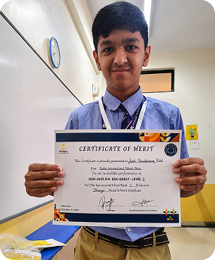 Student holding a certificate of merit